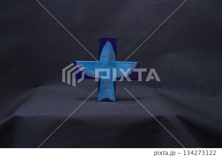 cross with an image of a flying bird cross with an image of a flying bird 134273122