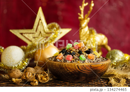 Memorial Christmas ritual dish in Ukraine. Traditional Christmas slavic kutia with ingredients. 134274465