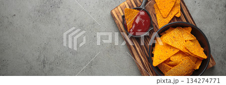 Nachos tortilla chips salsa dip wooden board Mexican Tex-Mex snack fast food copy space Nachos tortilla chips salsa dip wooden board Mexican Tex-Mex snack fast food copy space 134274771