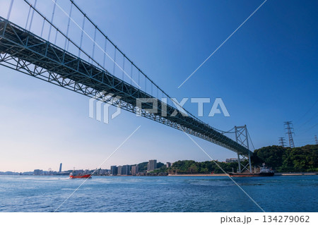 cargo ships pass through Kanmon Bridge, Kitakyushu, Fukuoka 134279062