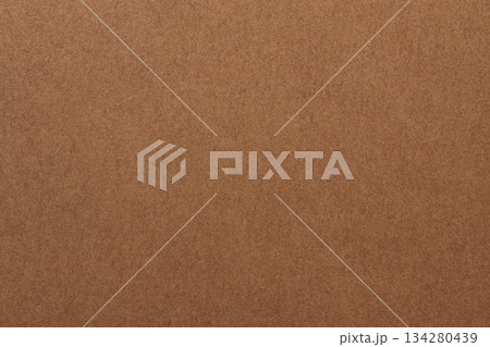 Craft Paper Surface with Grainy Texture and Earth Color Macro View Craft Paper Surface with Grainy Texture and Earth Color Macro View 134280439