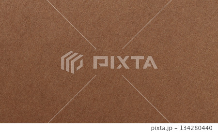 Craft Paper Surface with Grainy Texture and Earth Color Macro View 134280440