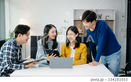 Group of Asian business meeting in planning design in creative business discussing work Group of Asian business meeting in planning design in creative business discussing work 134281033