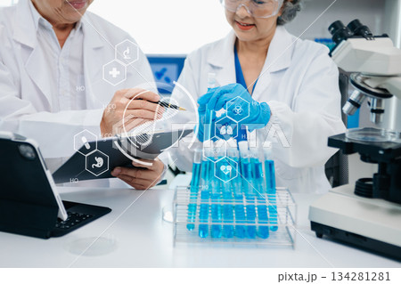 Scientist two woman with tablet and laptop, laboratory and ecofriendly science. Agriculture, research and scientists with online reading, test samples 134281281