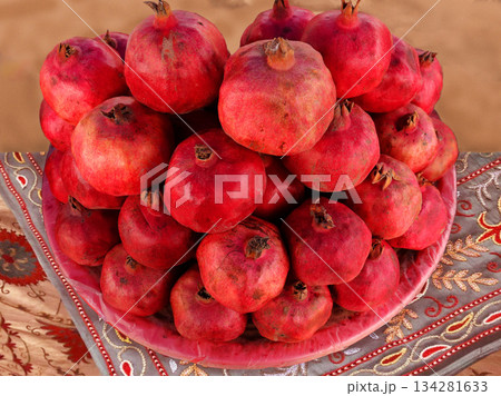pomegranate on a wooden background 134281633