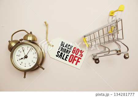 Black Friday Sale 80% off Limited time offer text with trolley shopping cart and alarm clock on pink background Black Friday Sale 80% off Limited time offer text with trolley shopping cart and alarm clock on pink background 134281777
