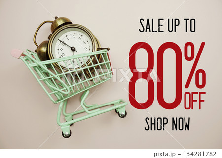 Sale 80% off Shop Now text with alarm clock and trolley shopping cart on pink background Sale 80% off Shop Now text with alarm clock and trolley shopping cart on pink background 134281782