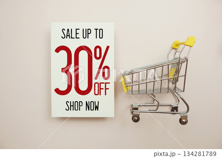 Sale 30% off text with trolley shopping cart on pink background 134281789