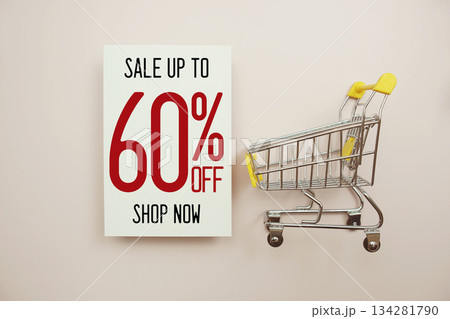Sale 60% off text with trolley shopping cart on wooden background 134281790