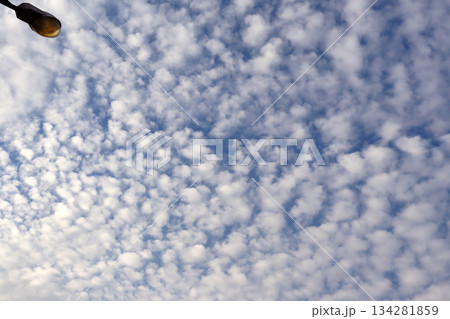 flying drone in the blue sky 134281859