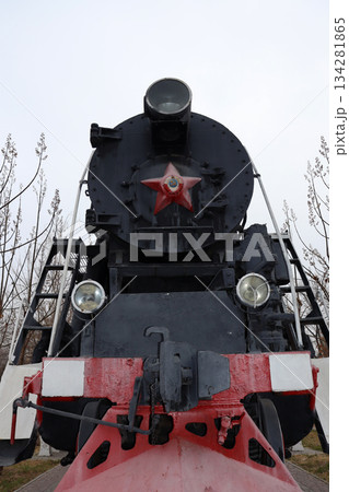 old steam locomotive stands on a sunny day 134281865