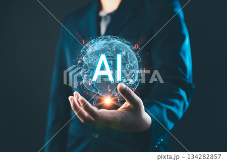 AI Artificial Intelligence technology concept, A businessman holding a glowing holographic globe with AI text, digital transformation, and innovation in technology for business and future development AI Artificial Intelligence technology concept, A businessman holding a glowing holographic globe with AI text, digital transformation, and innovation in technology for business and future development 134282857
