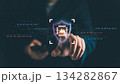 Cybersecurity concept with AI technology protection. Businessman touching virtual shield icon with artificial intelligence chip symbol, representing data security, privacy, and digital defense 134282867