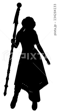 Silhouette of a Sorceress Holding a Magic Staff 134284133