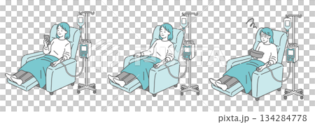 リクライニングで点滴を受ける女性の3点セット（スマホ・睡眠・吐き気） 134284778