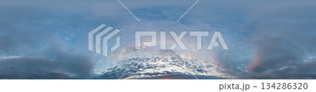 Sunset sky with bright glowing pink Cumulus clouds. Seamless spherical HDR 360 panorama. Full zenith or sky dome in 3D, sky replacement for aerial drone panoramas. Climate and weather change. 134286320