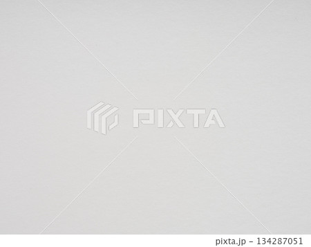 Soft white texture spreads across the paper, suggesting a quiet stillness and a gentle beginning 134287051