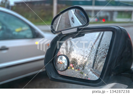 Rainy Car Window Abstract City Lights Rainy Car Window Abstract City Lights 134287238