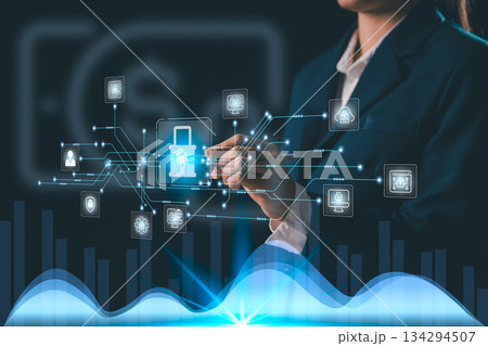 Business professional interacting glowing holographic lock connected through digital data flow icons representing cybersecurity secure networks data protection advanced information technology systems 134294507