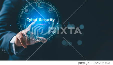 Business professional touching glowing holographic cyber security interface, representing data protection, network defense, digital privacy, secure access and advanced information security solutions. Business professional touching glowing holographic cyber security interface, representing data protection, network defense, digital privacy, secure access and advanced information security solutions. 134294508