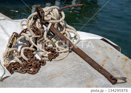 Old rusted anchor on the coast, Corfu, Greece 134295978