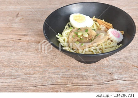 Tonkotsu Chashu ramen orJapanese yellow noodles topping slice braised pork with boiled egg in Miso soy sauce on bowl Tonkotsu Chashu ramen orJapanese yellow noodles topping slice braised pork with boiled egg in Miso soy sauce on bowl 134296731