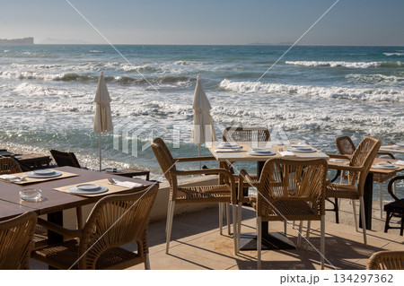 Empty restaurant terrace with seaview, Greece Empty restaurant terrace with seaview, Greece 134297362