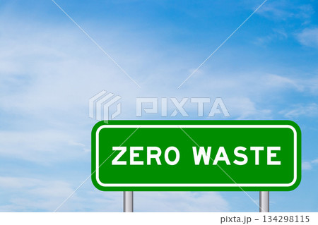 Green color transportation sign with word zero waste on blue sky with white cloud background 134298115
