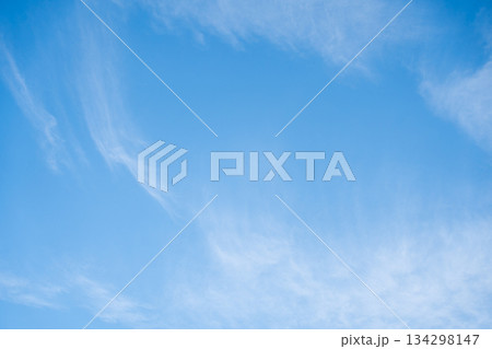 Clear blue sky with white cloud background 134298147