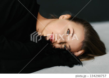 Glamorous Woman Resting In Black Fashion Glamorous Woman Resting In Black Fashion 134298757