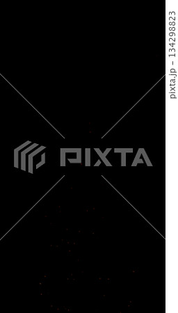 Realistic fire sparks flying through the air, isolated on a black background. Perfect as a cinematic VFX overlay, fire particles effect or visual element. 134298823