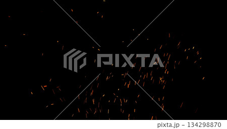 Realistic fire sparks flying through the air, isolated on a black background. Perfect as a cinematic VFX overlay, fire particles effect or visual element. Realistic fire sparks flying through the air, isolated on a black background. Perfect as a cinematic VFX overlay, fire particles effect or visual element. 134298870
