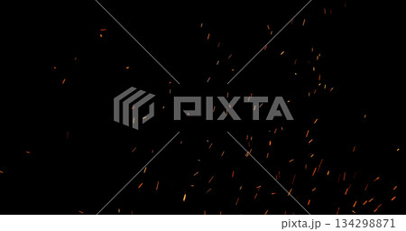 Realistic fire sparks flying through the air, isolated on a black background. Perfect as a cinematic VFX overlay, fire particles effect or visual element. Realistic fire sparks flying through the air, isolated on a black background. Perfect as a cinematic VFX overlay, fire particles effect or visual element. 134298871