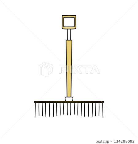 A yellow and brown rake with a white handle A yellow and brown rake with a white handle 134299092