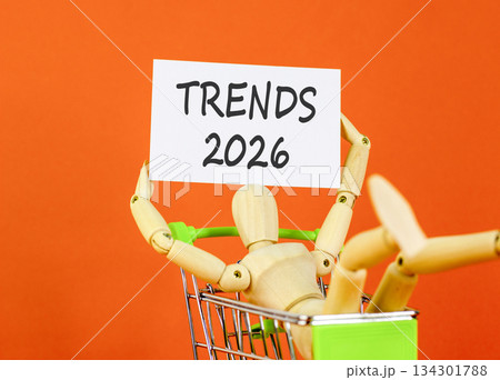 Trends 2026 new year symbol. Concept words Trends 2026 on beautiful white card. Beautiful orange paper background. Businessman's model. Business and Trends 2026 new year concept. Copy space. Trends 2026 new year symbol. Concept words Trends 2026 on beautiful white card. Beautiful orange paper background. Businessman's model. Business and Trends 2026 new year concept. Copy space. 134301788