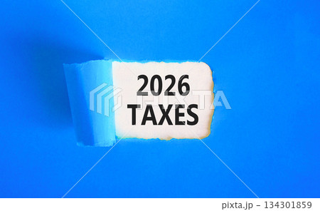 2026 taxes new year symbol. Concept words 2026 taxes on beautiful white paper. Beautiful blue paper background. Business and 2026 taxes new year concept. Copy space. 2026 taxes new year symbol. Concept words 2026 taxes on beautiful white paper. Beautiful blue paper background. Business and 2026 taxes new year concept. Copy space. 134301859