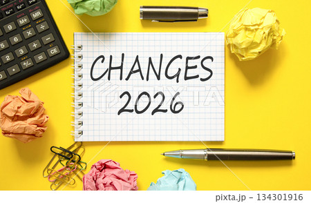 Changes 2026 symbol. Concept words Changes 2026 on beautiful white note. Beautiful yellow paper background. Beautiful black pen, calculator. Business and changes 2026 concept. Copy space. 134301916