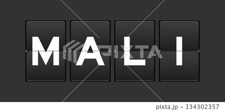 Black color analog flip board with word mali on gray background 134302357