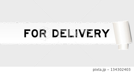 Ripped gray paper background that have word for delivery under torn part 134302403