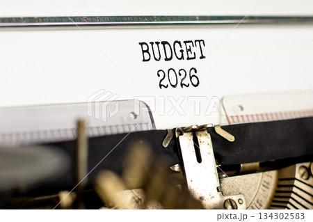 Budget 2026 symbol. Concept words Budget 2026 typed on beautiful old retro typewriter. Beautiful white paper background. Beautiful old typewriter. Business and budget 2026 concept. Copy space. Budget 2026 symbol. Concept words Budget 2026 typed on beautiful old retro typewriter. Beautiful white paper background. Beautiful old typewriter. Business and budget 2026 concept. Copy space. 134302583