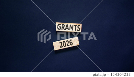 Grants 2026 symbol. Concept words Grants 2026 on beautiful wooden blocks. Beautiful black paper background. Business and grants 2026 concept. Copy space. Grants 2026 symbol. Concept words Grants 2026 on beautiful wooden blocks. Beautiful black paper background. Business and grants 2026 concept. Copy space. 134304232