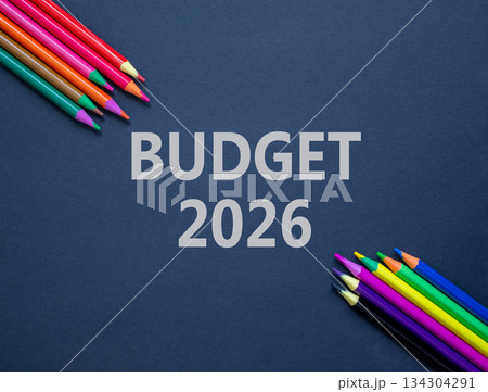 Budget 2026 symbol. Concept words Budget 2026 on beautiful black paper. Beautiful black paper background. Beautiful colored pencils. Business and budget 2026 concept. Copy space. 134304291