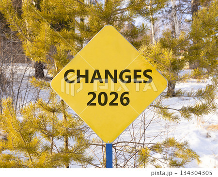 Changes 2026 symbol. Concept words Changes 2026 on beautiful yellow road sign. Beautiful winter forest background. Business and changes 2026 concept. Copy space. Changes 2026 symbol. Concept words Changes 2026 on beautiful yellow road sign. Beautiful winter forest background. Business and changes 2026 concept. Copy space. 134304305