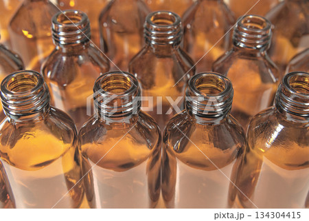 Brown glass bottles background Brown glass bottles background 134304415