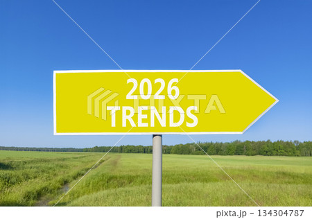 2026 Trends new year symbol. Concept words 2026 Trends on beautiful yellow road sign. Beautiful green grass field forest and blue sky background. Business and 2026 Trends new year concept. Copy space. 134304787