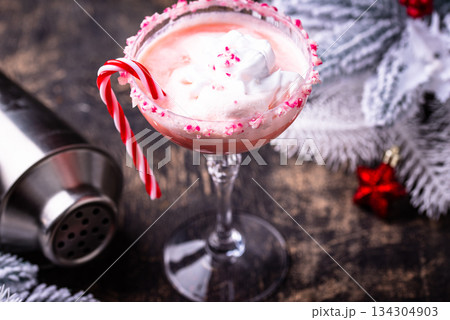 Christmas drink pink peppermint martini 134304903