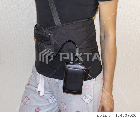 Patient wearing recording device of capsule endoscopy procedure Patient wearing recording device of capsule endoscopy procedure 134305020