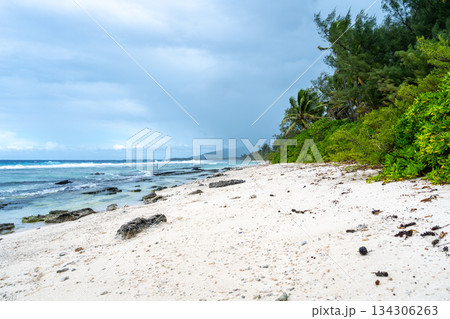 Tropical beach with white sand and turquoise waters on Huahine island, French Polynesia 134306263