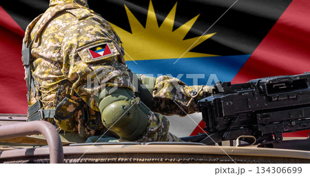 Antigua and Barbuda flag with soldier at machinegun turret 134306699