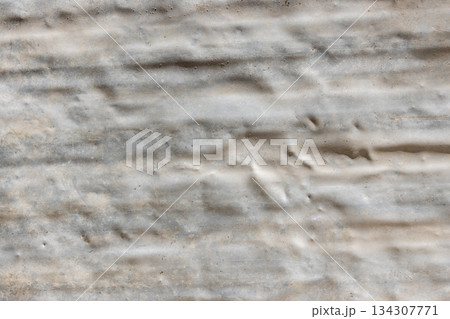 Wrinkled dirty aluminum sheet on ground outdoors during daytime 134307771